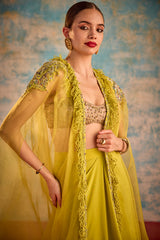Lime green embroidered cape style ensemble